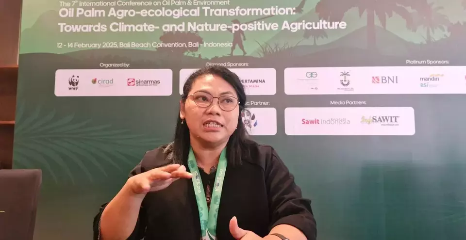 Reni Subawati, a researcher at SMART Research Institute, addressing reporters at the International Conference on Oil Palm & Environment (ICOPE) 2025 in Bali, Friday, Feb. 14, 2025. (The Jakarta Globe/Faisal Maliki Baskoro)